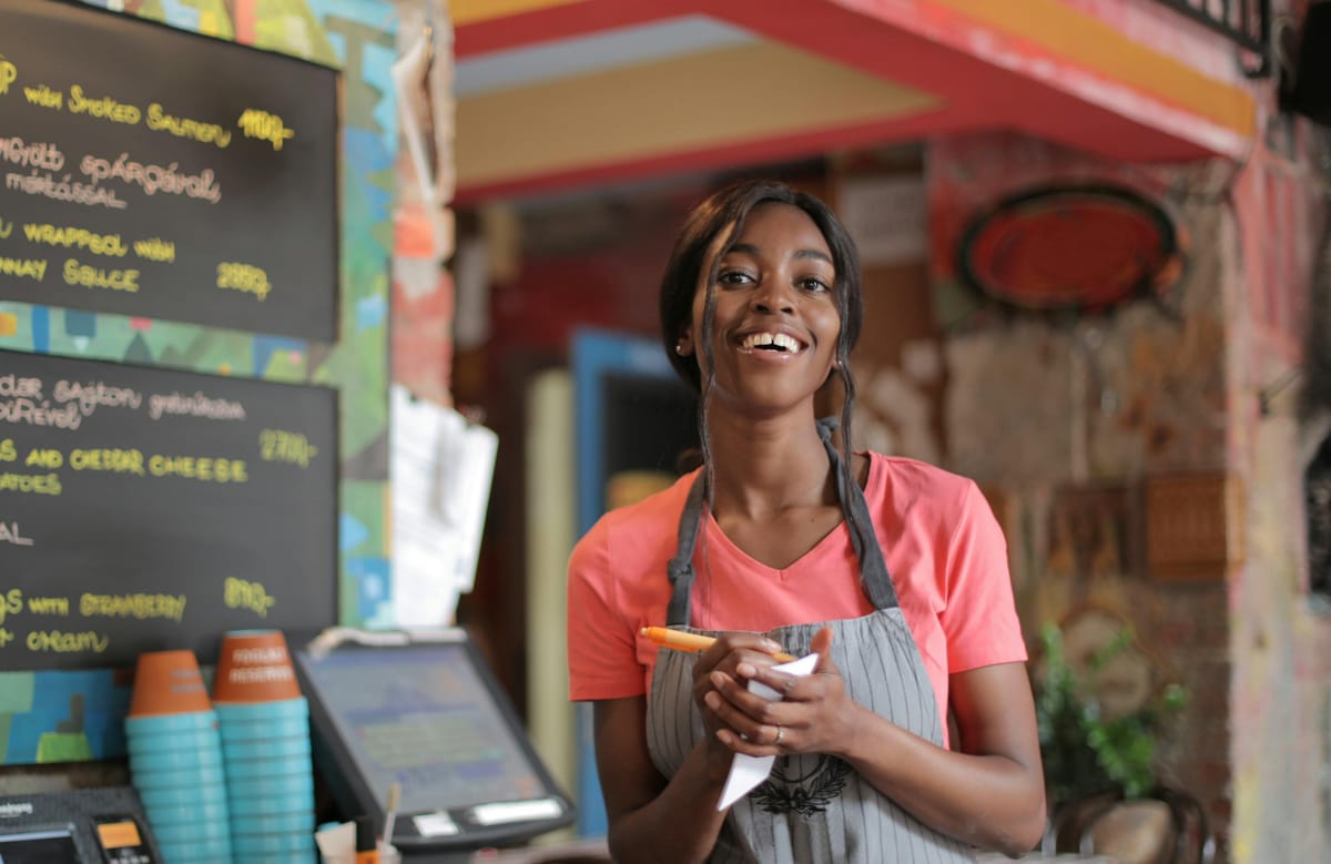 Teenager working in a cafe